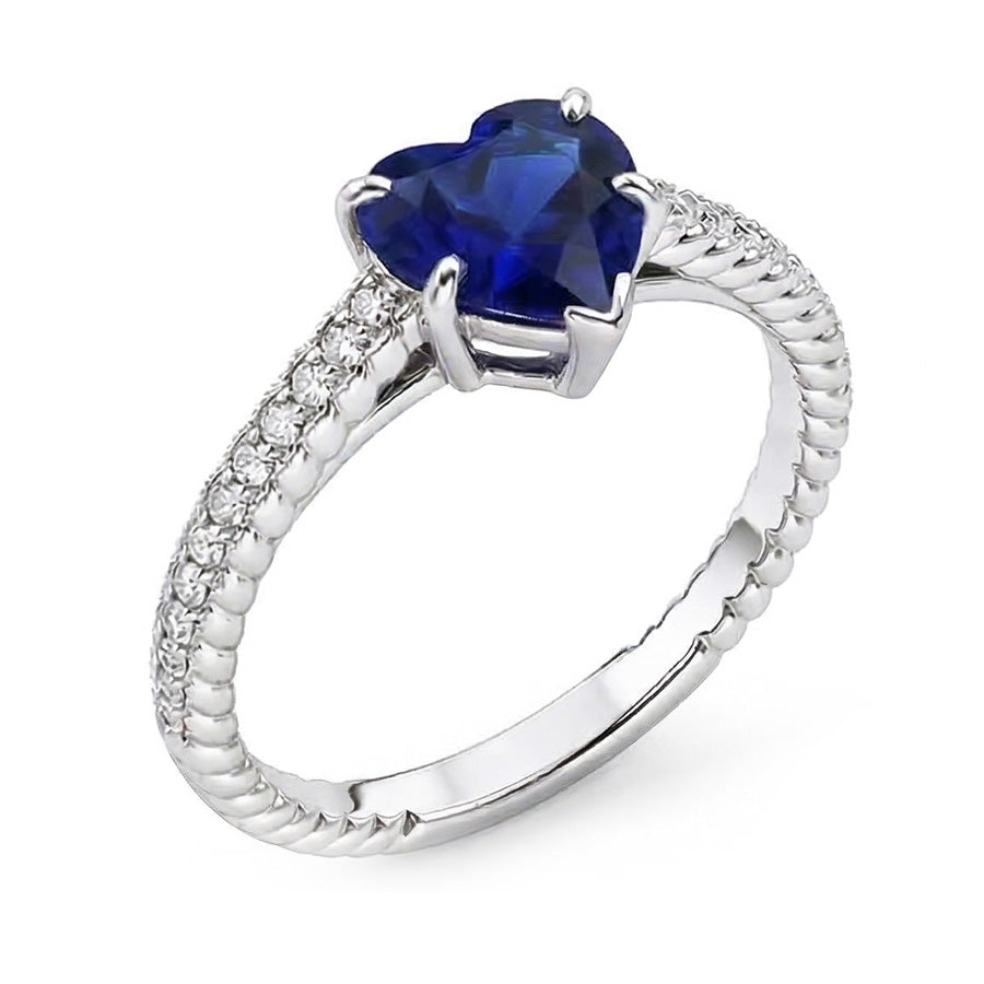 Anello solitario con zaffiro di Ceylon e pavé con accenti di diamanti 2.50 carati