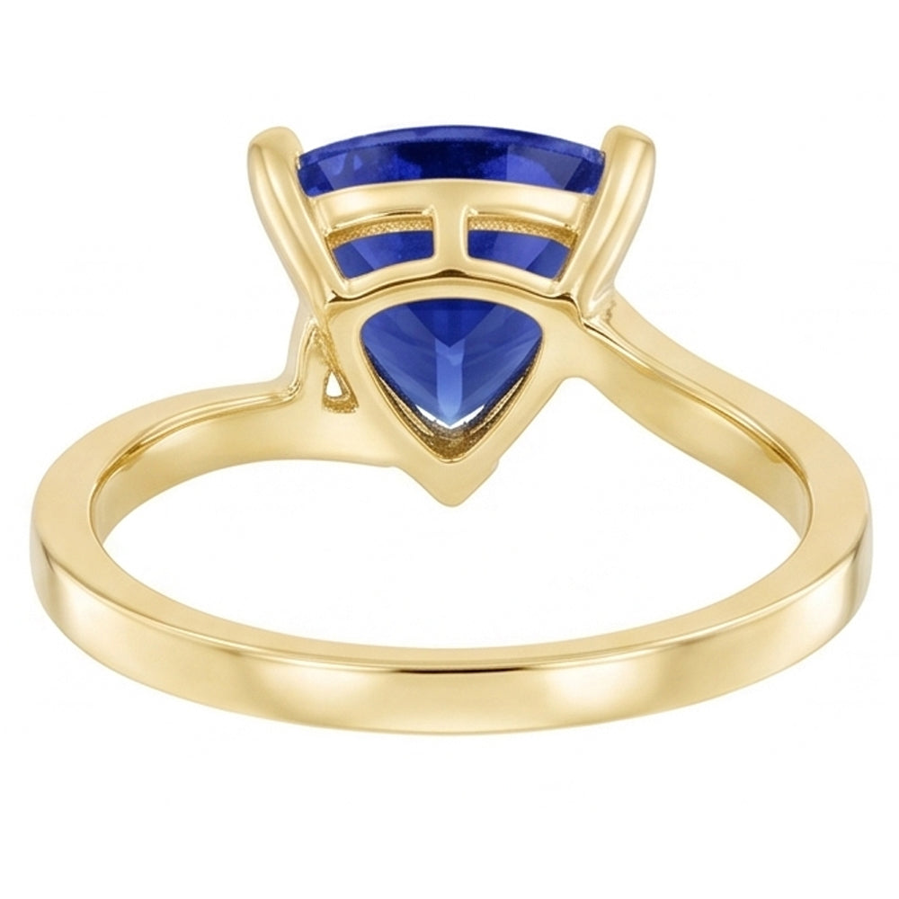 Anello solitario in stile bypass trilioni con zaffiro da 1,50 carati in oro giallo 14K