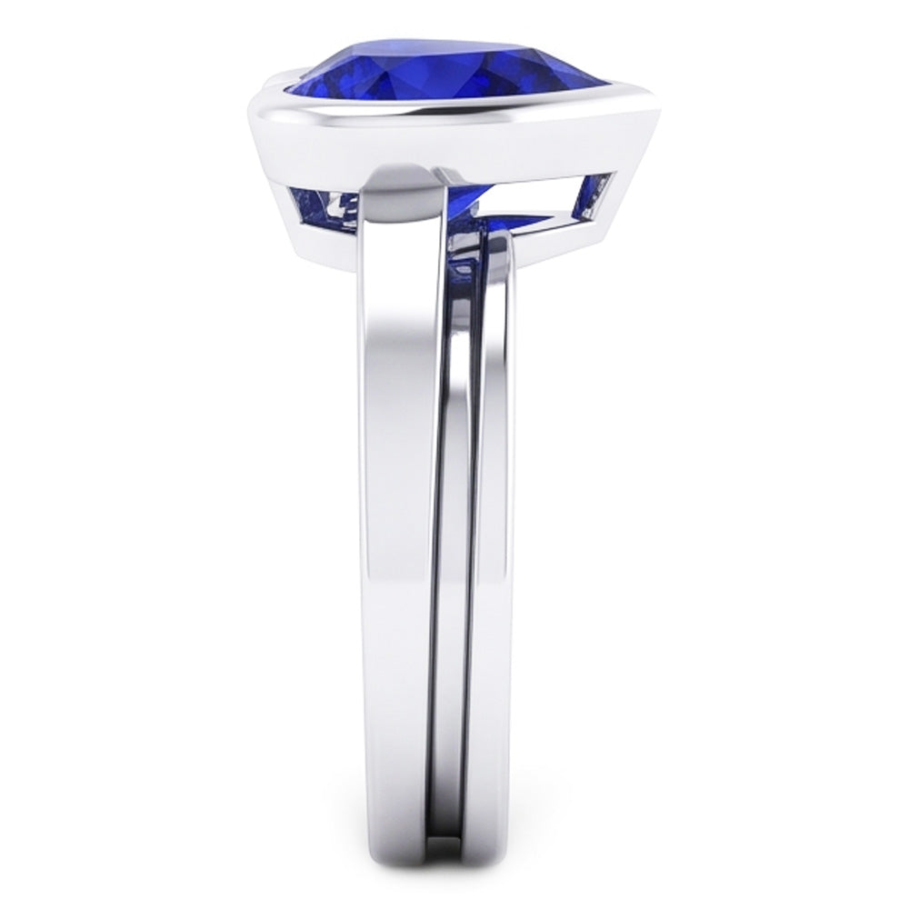 Anello solitario in zaffiro blu 3 carati con castone a forma di cuore incastonato in oro 14k
