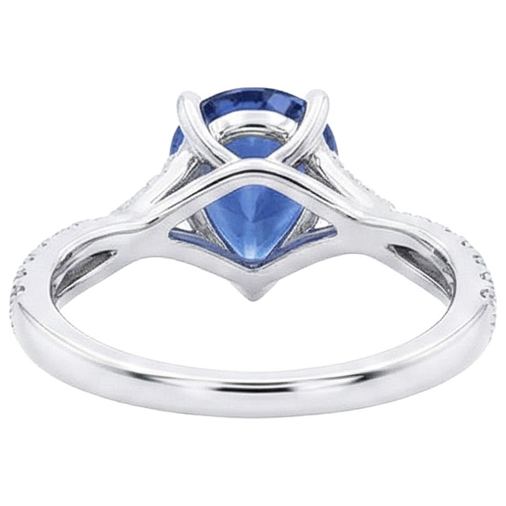 Anello solitario zaffiro blu oro bianco pavé di diamanti 4 carati