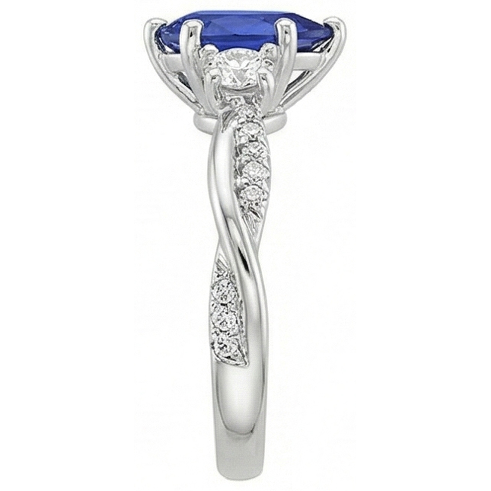 Anello stile 3 pietre con accenti diamante e zaffiro blu pera 6 carati