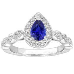 Anello Halo con zaffiro blu 3 carati e accenti di diamanti rotondi in oro bianco 14K