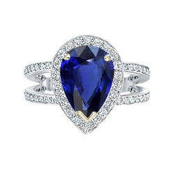 Anello Halo con zaffiro blu 4,50 carati e diamanti in oro 14K bicolore