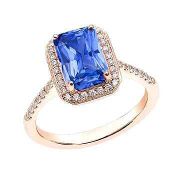 Anello Halo con zaffiro blu brillante da 3,50 carati e diamanti in oro rosa 14K