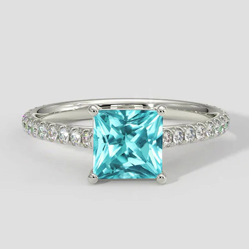 Anello Paraiba con cuscino e pavé di diamanti