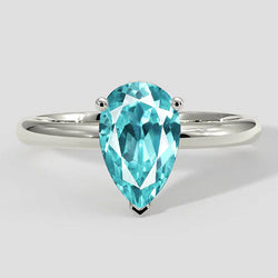Anello Paraiba con montatura a pera e solitario