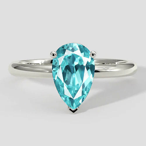 Anello Paraiba con montatura a pera e solitario