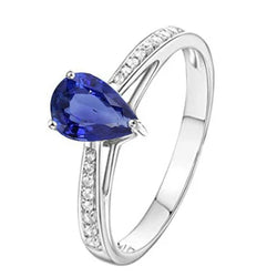 Anello Solitario con accenti di zaffiro blu 2,50 carati e pavé di diamanti in oro bianco 14K