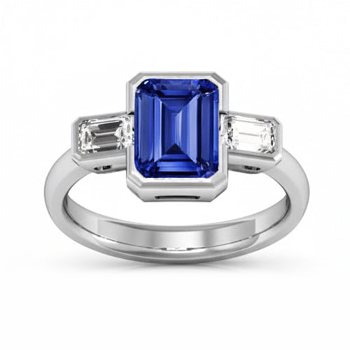 Anello con zaffiro smeraldo e diamante da 1,75 carati incastonato di tre pietre a mezza lunetta