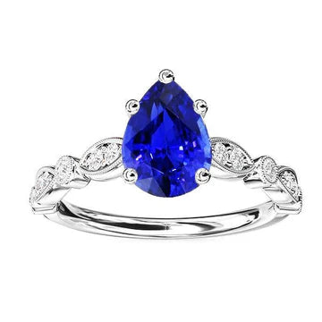 Anello anniversario con zaffiro dello Sri Lanka da 2,50 carati e diamante a pera in oro bianco 14K