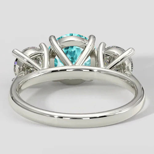 Anello a tre pietre con tormalina Paraiba e diamanti rotondi