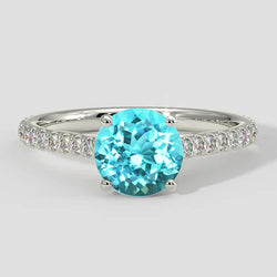 Anello con diamante Paraiba bluastro rotondo da 2 carati e diamanti