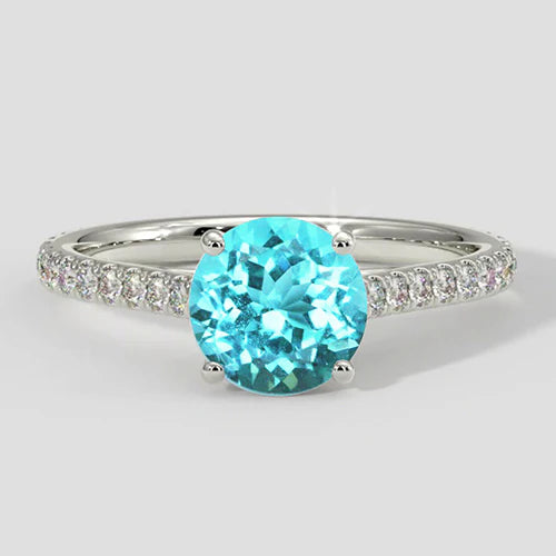 Anello con diamante Paraiba bluastro rotondo da 2 carati e diamanti