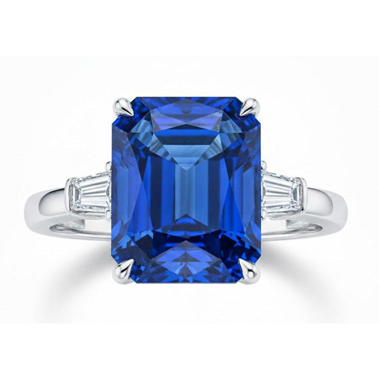 Anello con diamante artigli d'aquila incastonato con zaffiro blu radiante oro 7 carati 14K