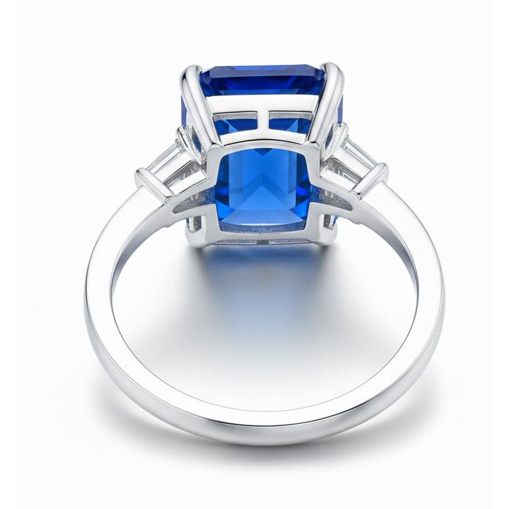 Anello con diamante artigli d'aquila incastonato con zaffiro blu radiante oro 7 carati 14K