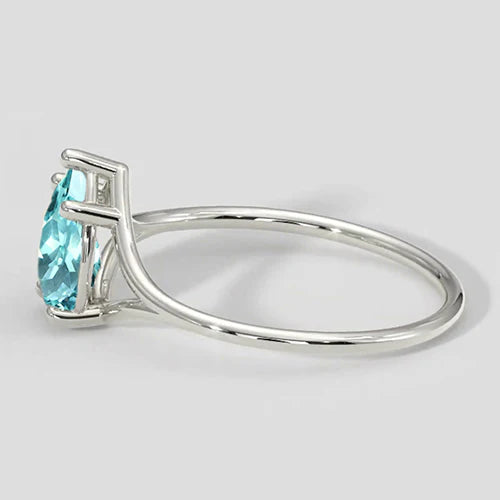 Anello con gambo diviso a pera Paraiba da 1 ct