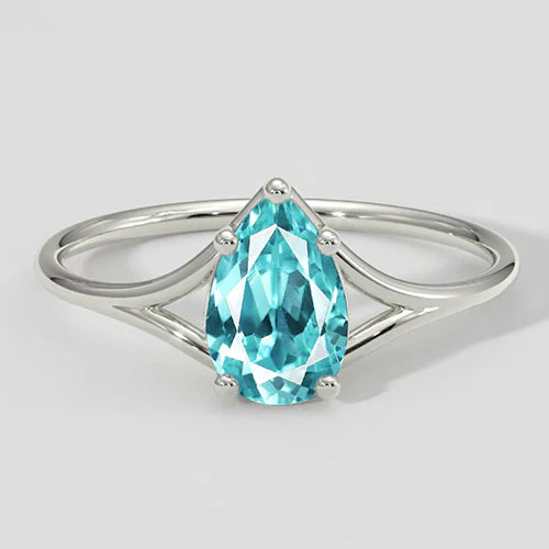 Anello con gambo diviso a pera Paraiba da 1 ct