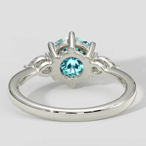 Anello con tormalina Paraiba bluastra elettrica e diamanti