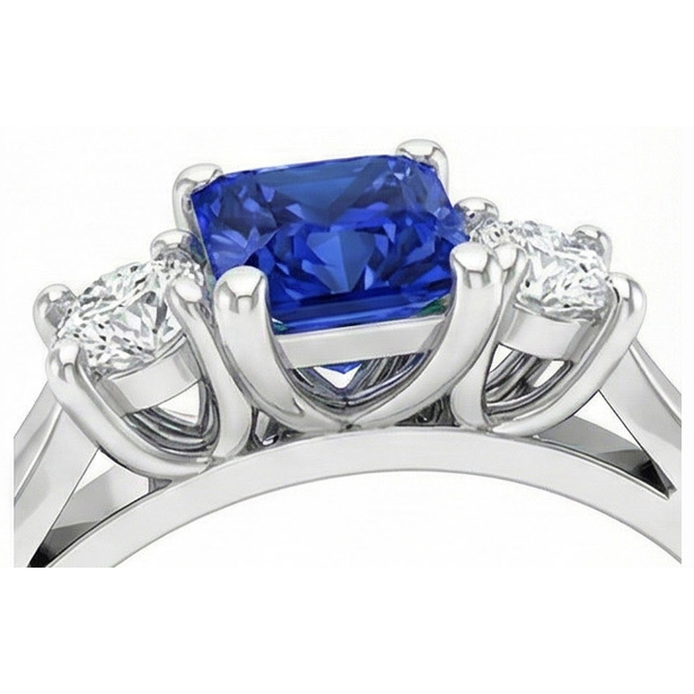 Anello da donna con diamanti tondi. 1,25 carati. Zaffiro di Ceylon. Montatura a U e oro bianco 14K