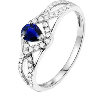 Anello di fidanzamento con stelo ritorto in zaffiro blu da 2,50 carati con oro bianco 14K