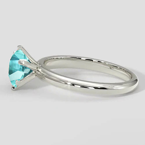 Anello di fidanzamento con tormalina Paraiba rotonda