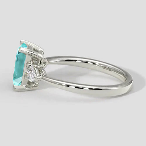 Anello di fidanzamento con tre pietre a cuscino Paraiba