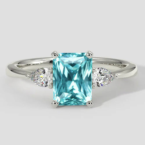 Anello di fidanzamento con tre pietre a cuscino Paraiba