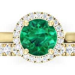 Anello in oro giallo con smeraldo verde rotondo