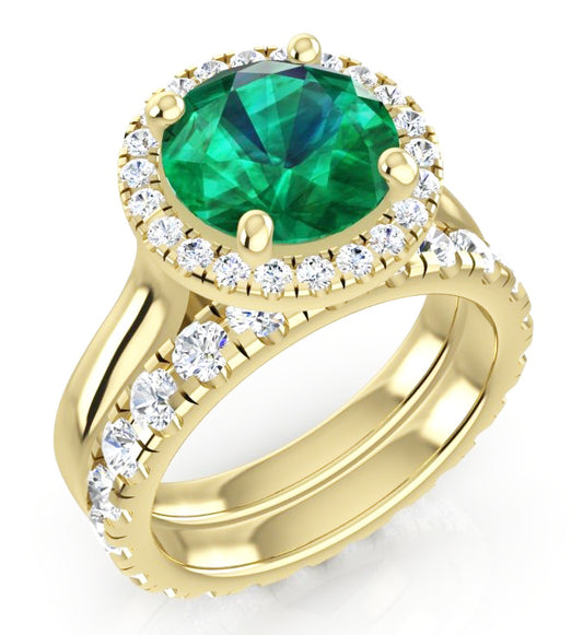 Anello in oro giallo con smeraldo verde rotondo