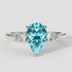 Anello laterale con pietra Paraiba a forma di pera