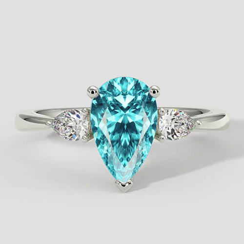 Anello laterale con pietra Paraiba a forma di pera