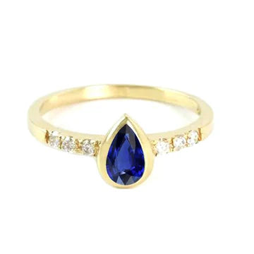 Anello per l'anniversario con zaffiro blu 2 carati pera con accenti in oro bianco 14K