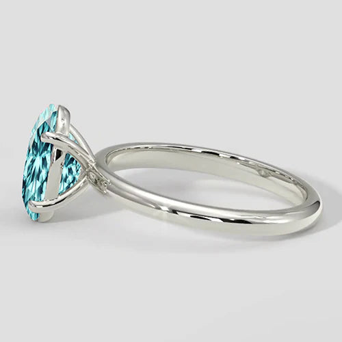 Anello solitario Paraiba ovale bluastro da 3 carati
