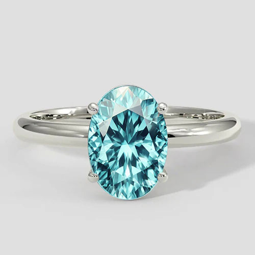 Anello solitario Paraiba ovale bluastro da 3 carati