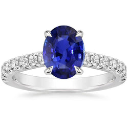 Anello solitario con zaffiro blu ovale a 4 carati e accenti di diamanti in oro bianco 14K