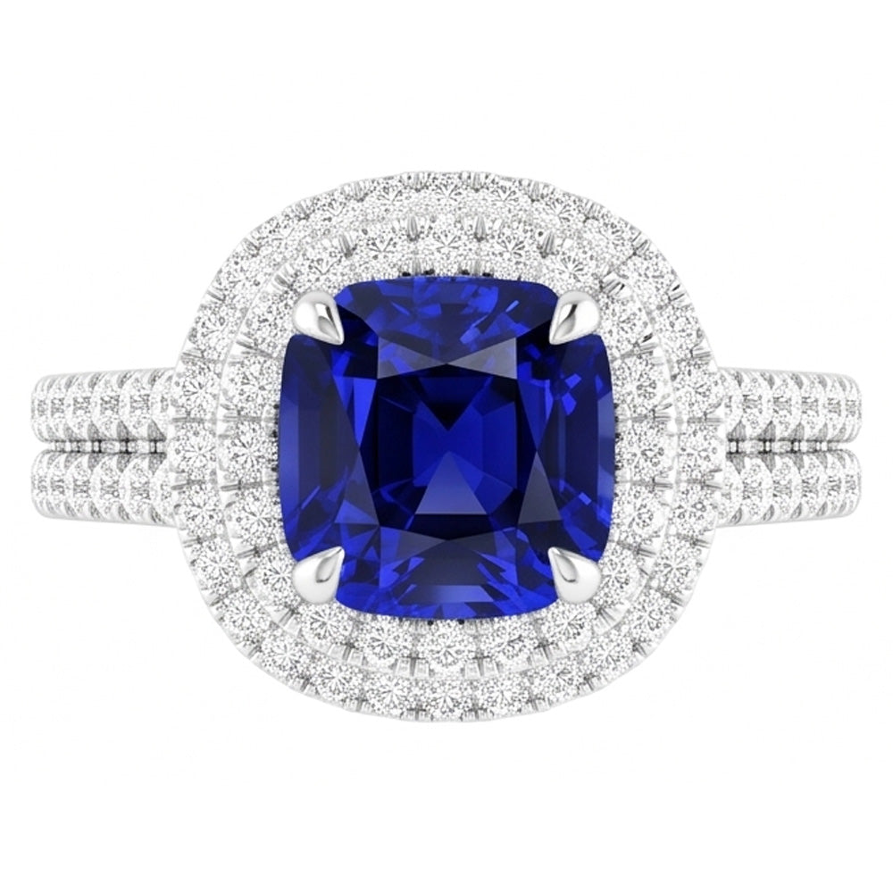 Doppio anello Halo con cuscino da 4,50 carati in zaffiro blu con gambo diviso in pavé
