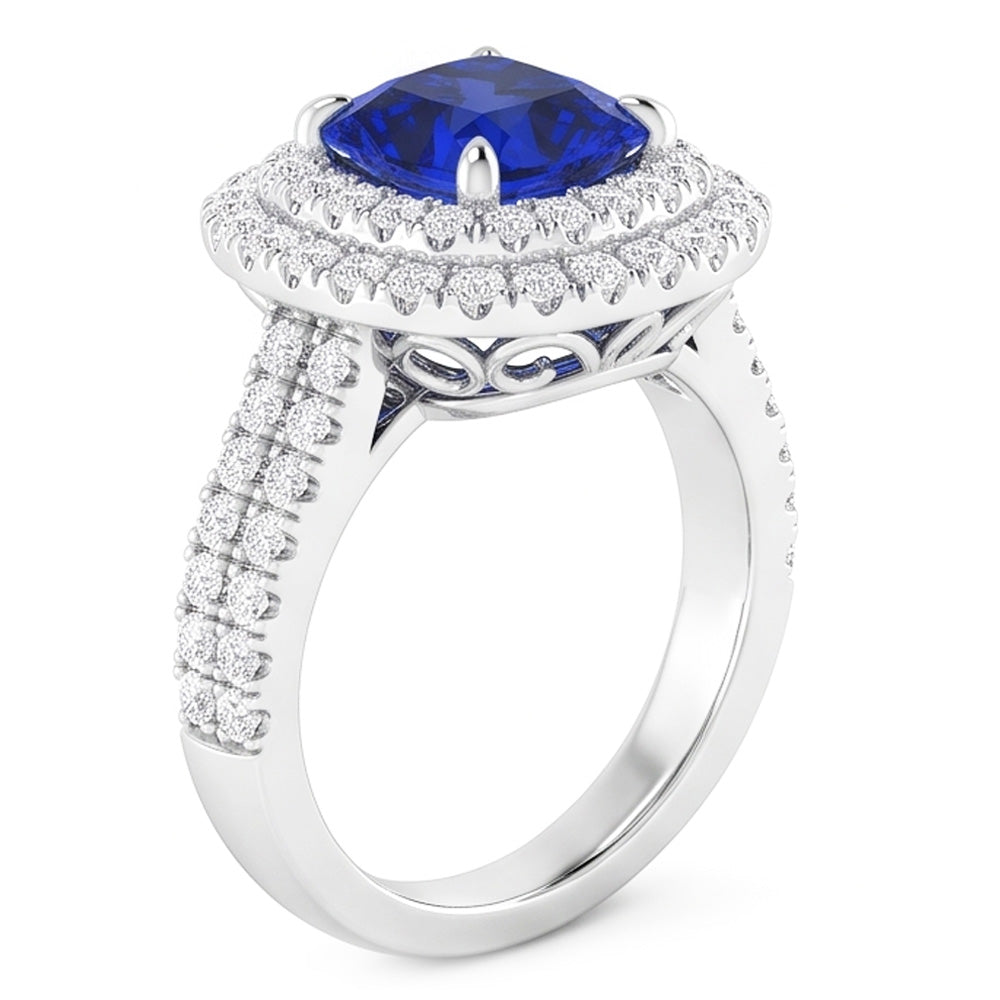 Doppio anello Halo con cuscino da 4,50 carati in zaffiro blu con gambo diviso in pavé