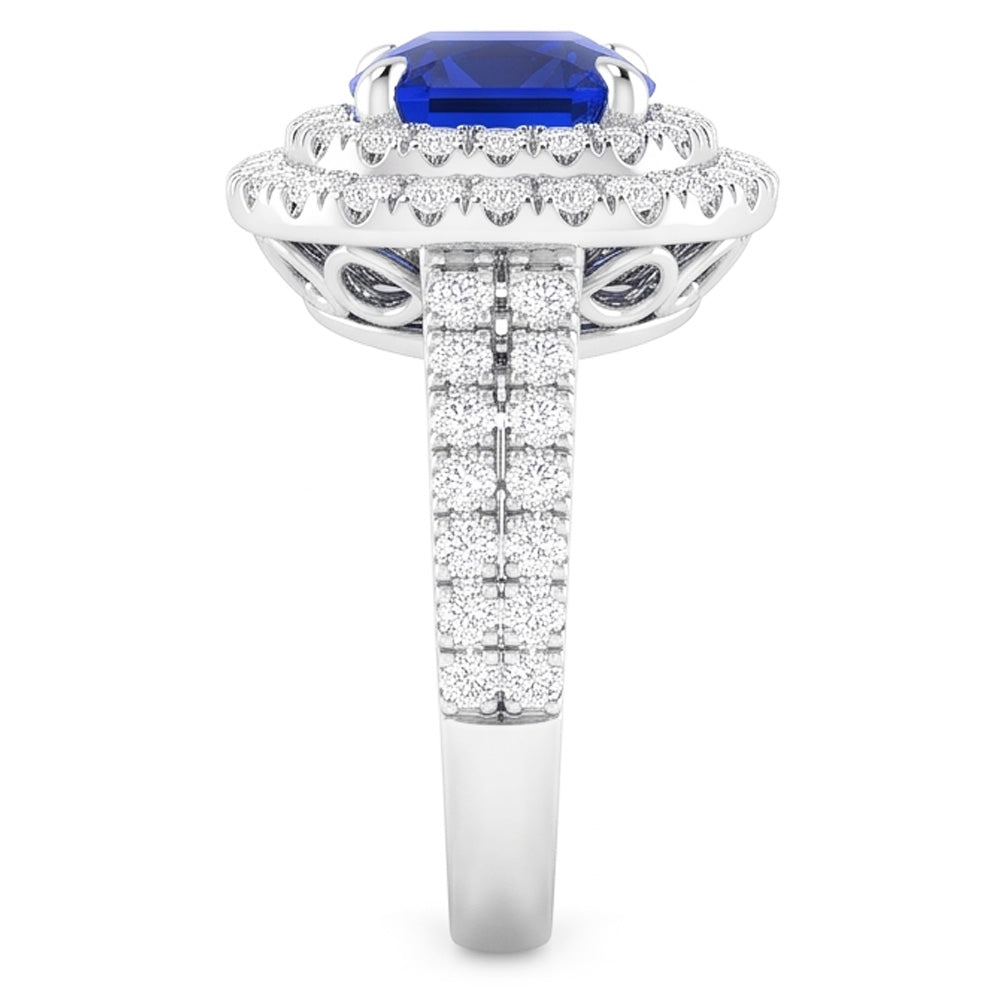 Doppio anello Halo con cuscino da 4,50 carati in zaffiro blu con gambo diviso in pavé