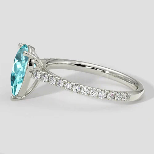 Elegante anello Paraiba taglio a pera con pavé