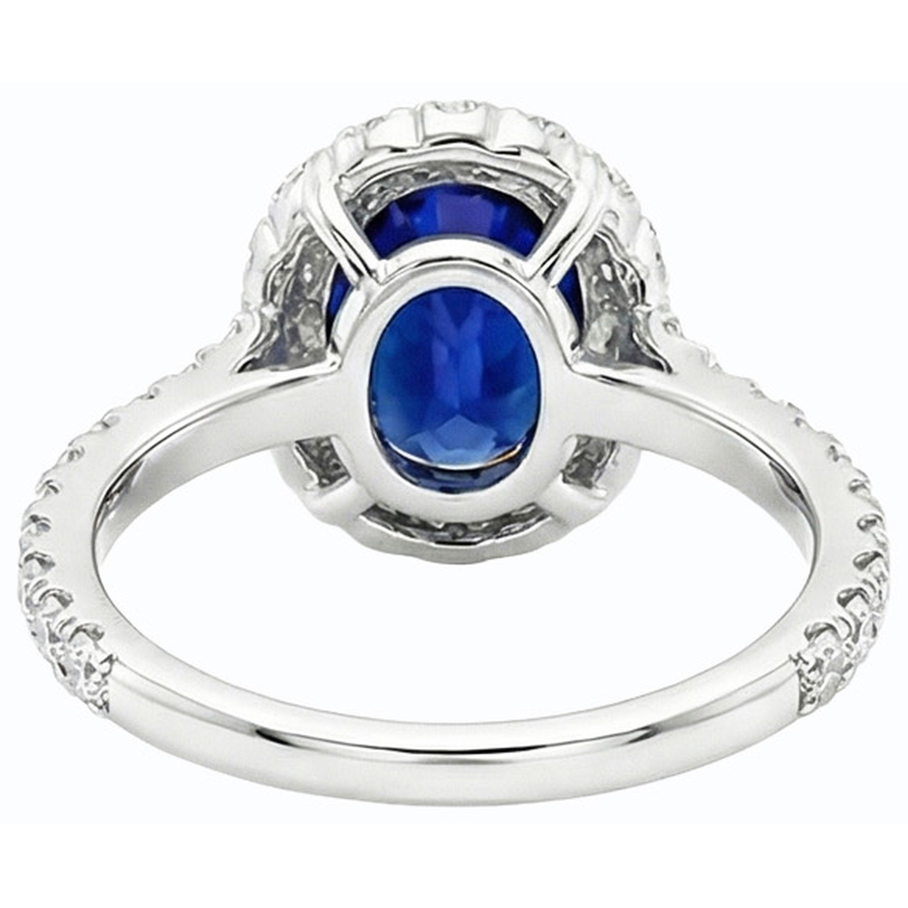 Fede Halo con 6 carati Zaffiro ovale blu intenso in oro bianco 14K
