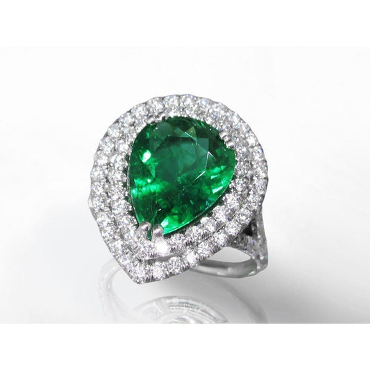 Fede nuziale con smeraldo taglio pera con alone e diamante rotondo. oro 5.50 ct - harrychadent.it