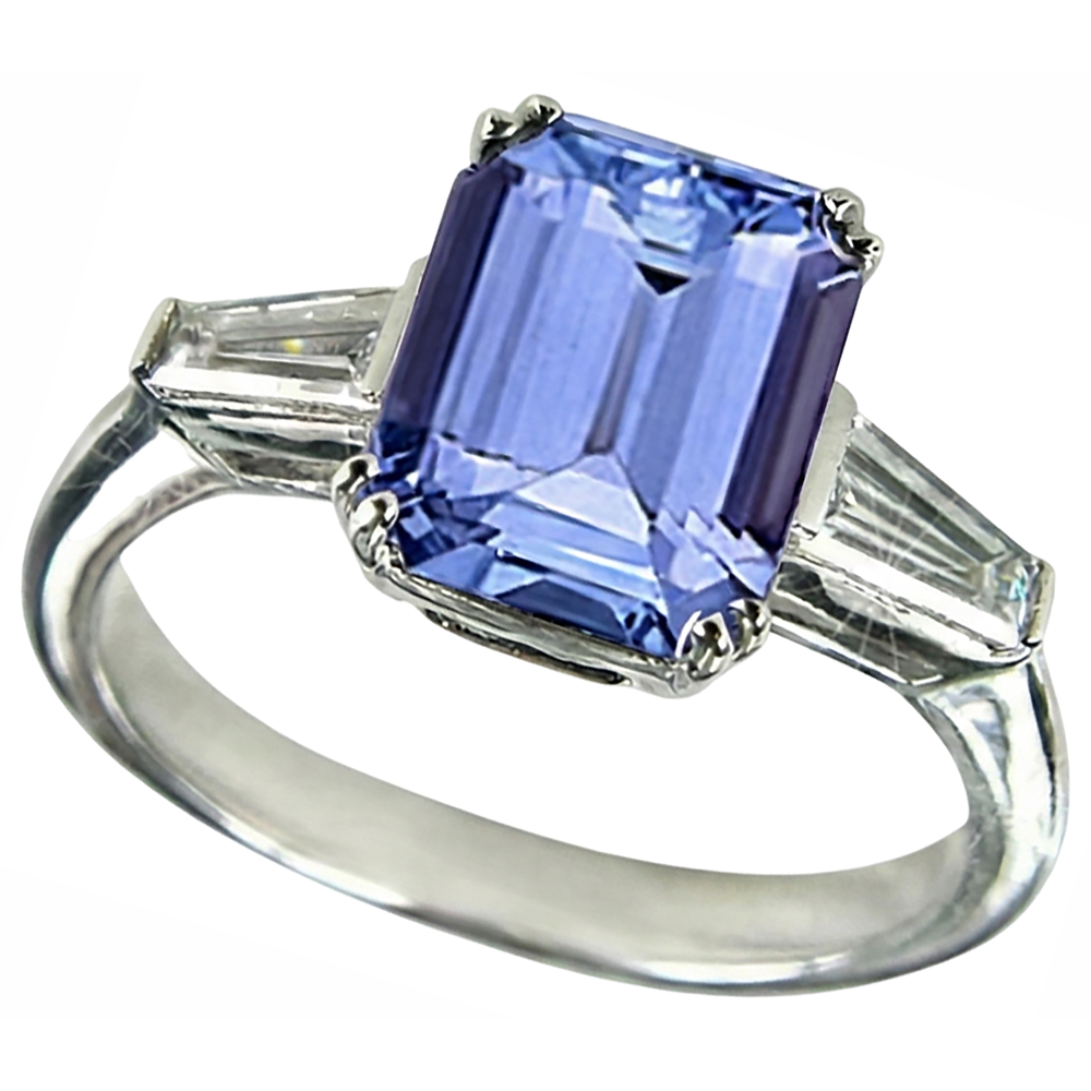 Fede nuziale con tre pietre di tanzanite e diamanti baguette da 2 ct