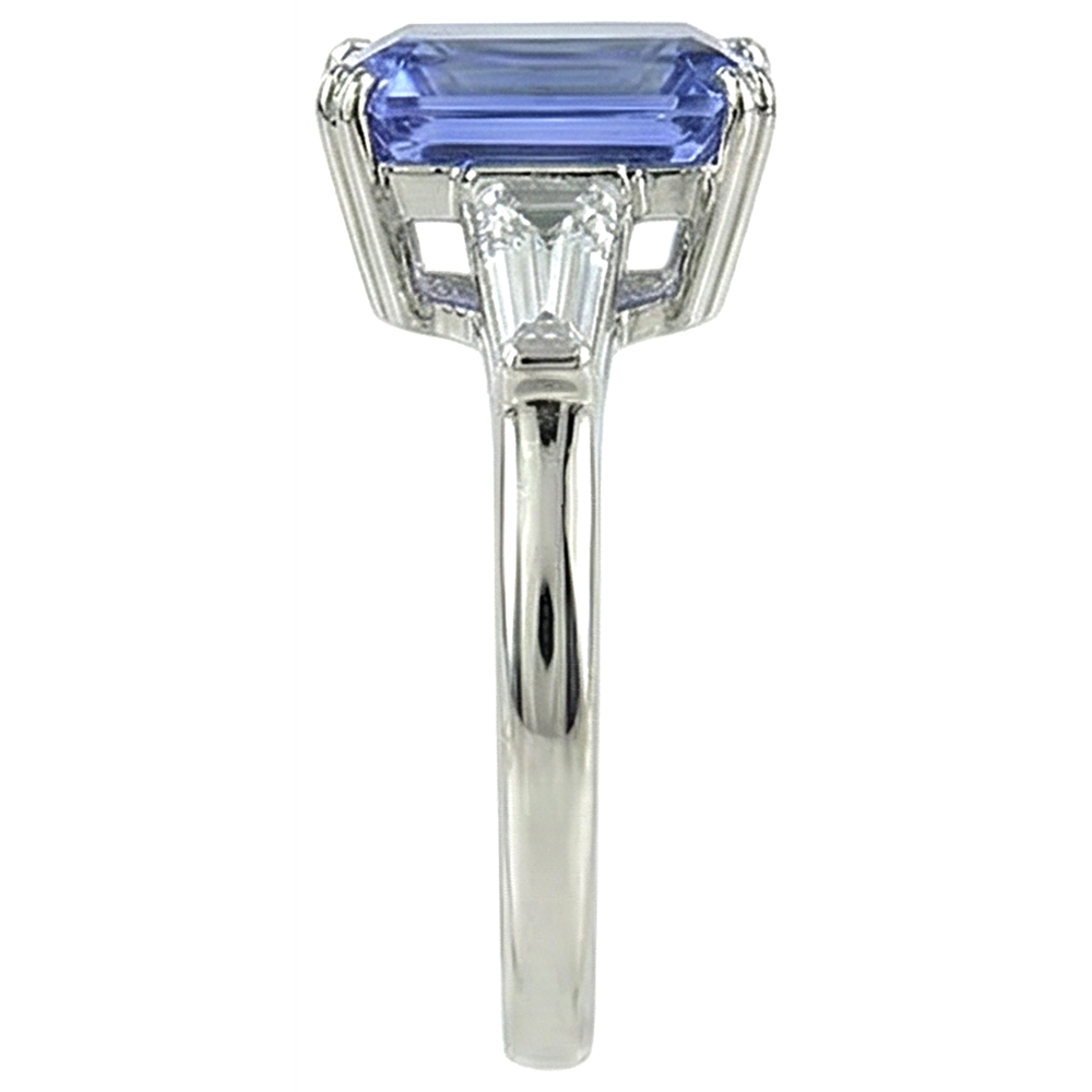 Fede nuziale con tre pietre di tanzanite e diamanti baguette da 2 ct