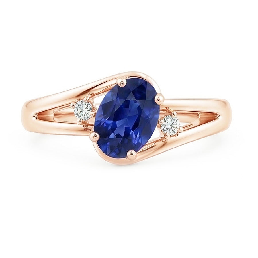 Fede nuziale in oro rosa con 3 pietre. 2.25 carati. gioielli con zaffiro blu ovale