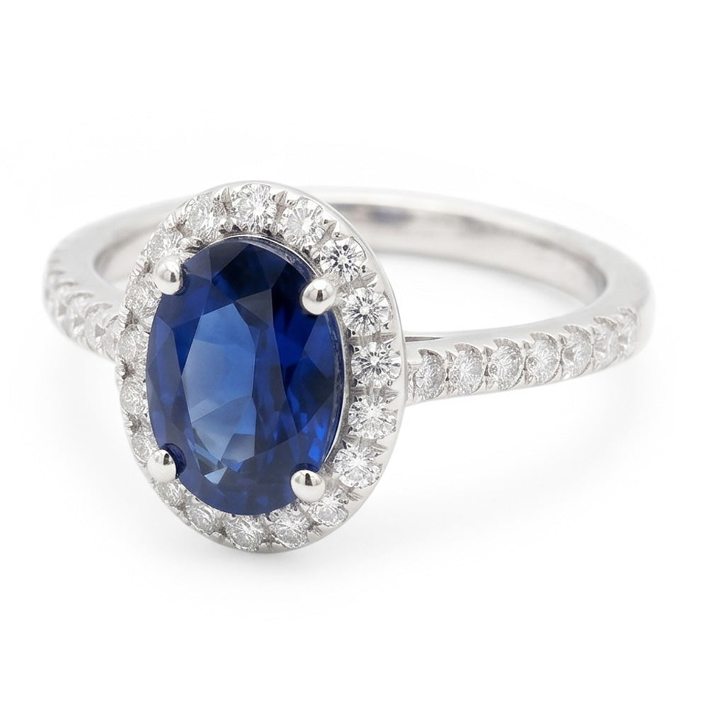 Fede nuziale ovale con zaffiro blu e diamanti da 2.25 carati. oro bianco 14K