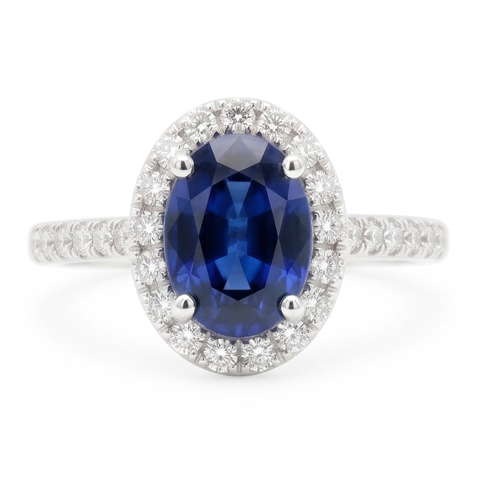 Fede nuziale ovale con zaffiro blu e diamanti da 2.25 carati. oro bianco 14K