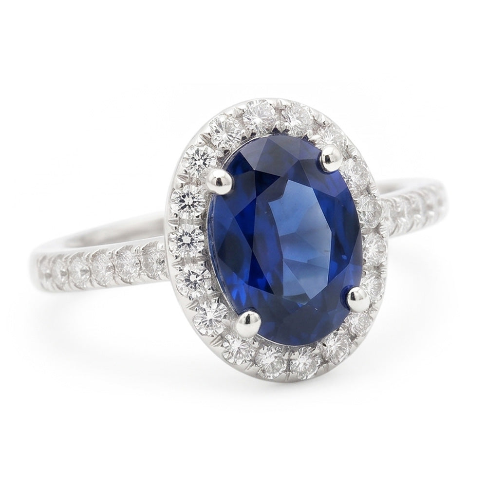 Fede nuziale ovale con zaffiro blu e diamanti da 2.25 carati. oro bianco 14K
