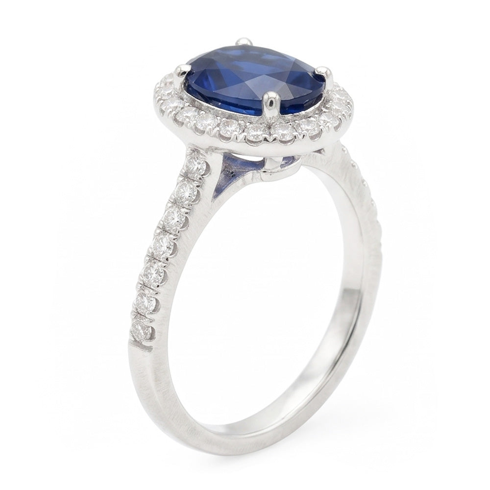 Fede nuziale ovale con zaffiro blu e diamanti da 2.25 carati. oro bianco 14K