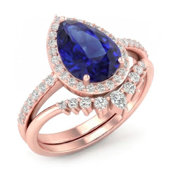 Fedi nuziali a forma di pera con zaffiro blu intenso e diamanti 4.50 carati