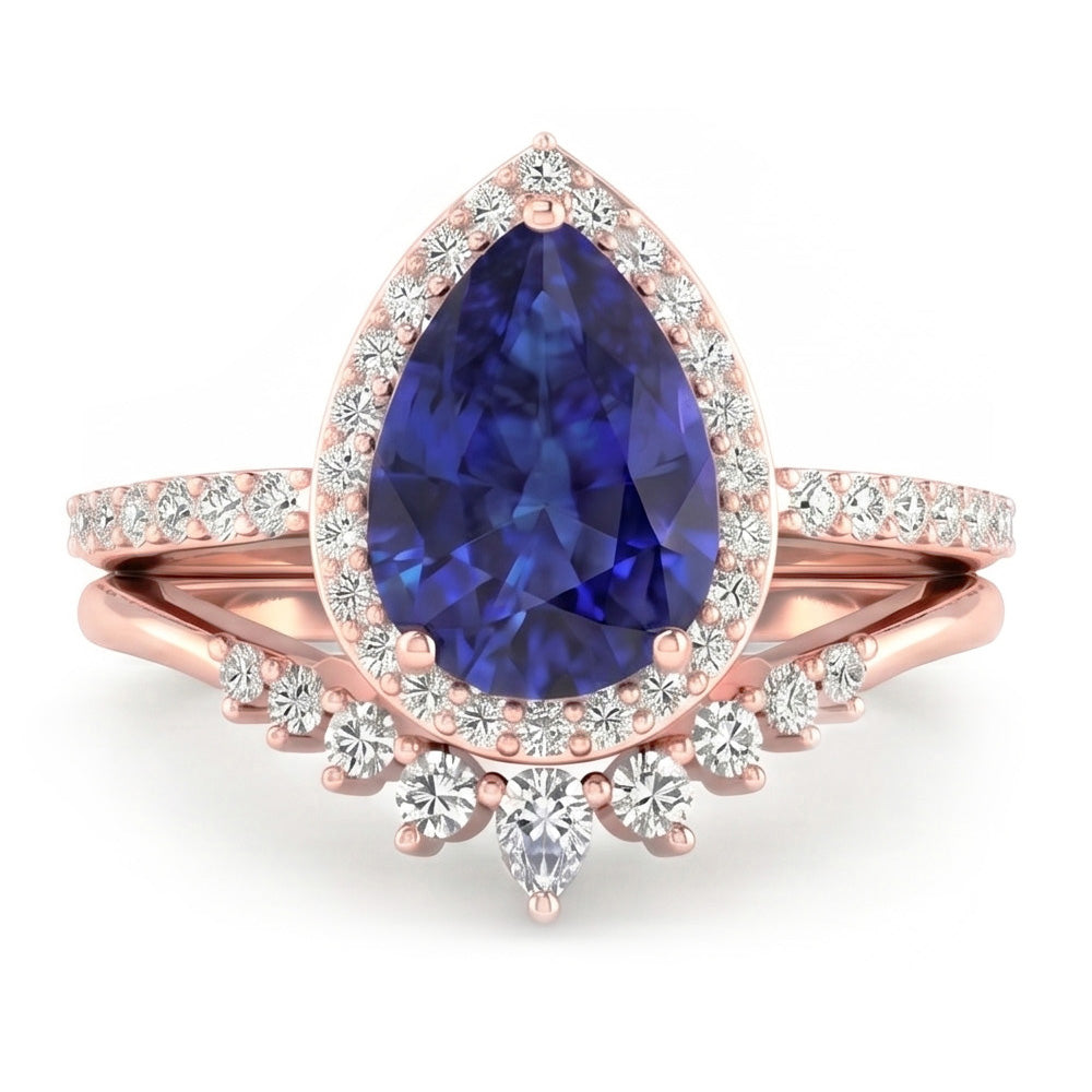 Fedi nuziali a forma di pera con zaffiro blu intenso e diamanti 4.50 carati